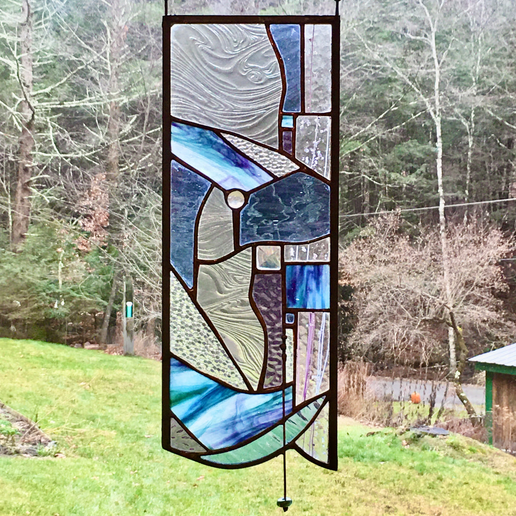 Small organic stained glass panel with bead handmade by Julia Brandis.