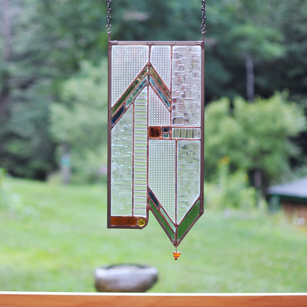 Stained glass panel with architectural lines made by Vermont artist Julia Brandis. Mission style / Prairie style.