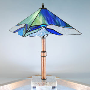 Large stained glass lamp with organic swirls made by Vermont artist Julia Brandis. Organic abstract.