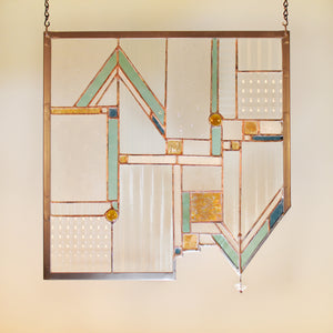 Stained glass panel with architectural lines made by Vermont artist Julia Brandis. Abstract, Mission style/ Prairie style.