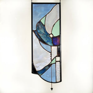 Small stained glass panel with organic lines made by Vermont artist Julia Brandis. Organic abstract.